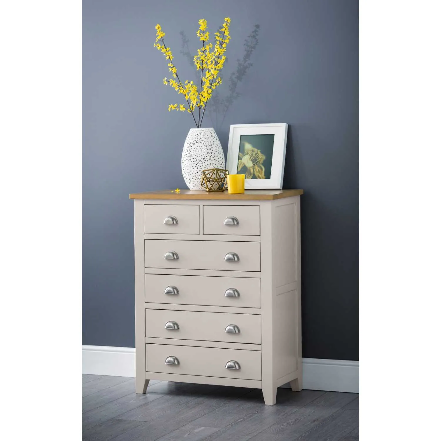 Grey chest of drawers deals with oak top